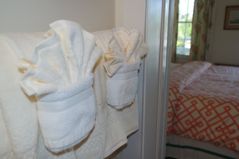 Guest room with tropical decor at Heron House Court