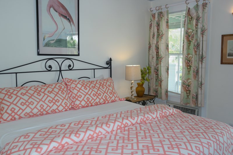 Tropical deluxe room with king bed and island-inspired décor